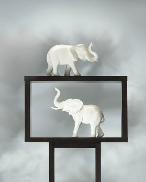 SLEEK WHITE CERAMIC ELEPHANT